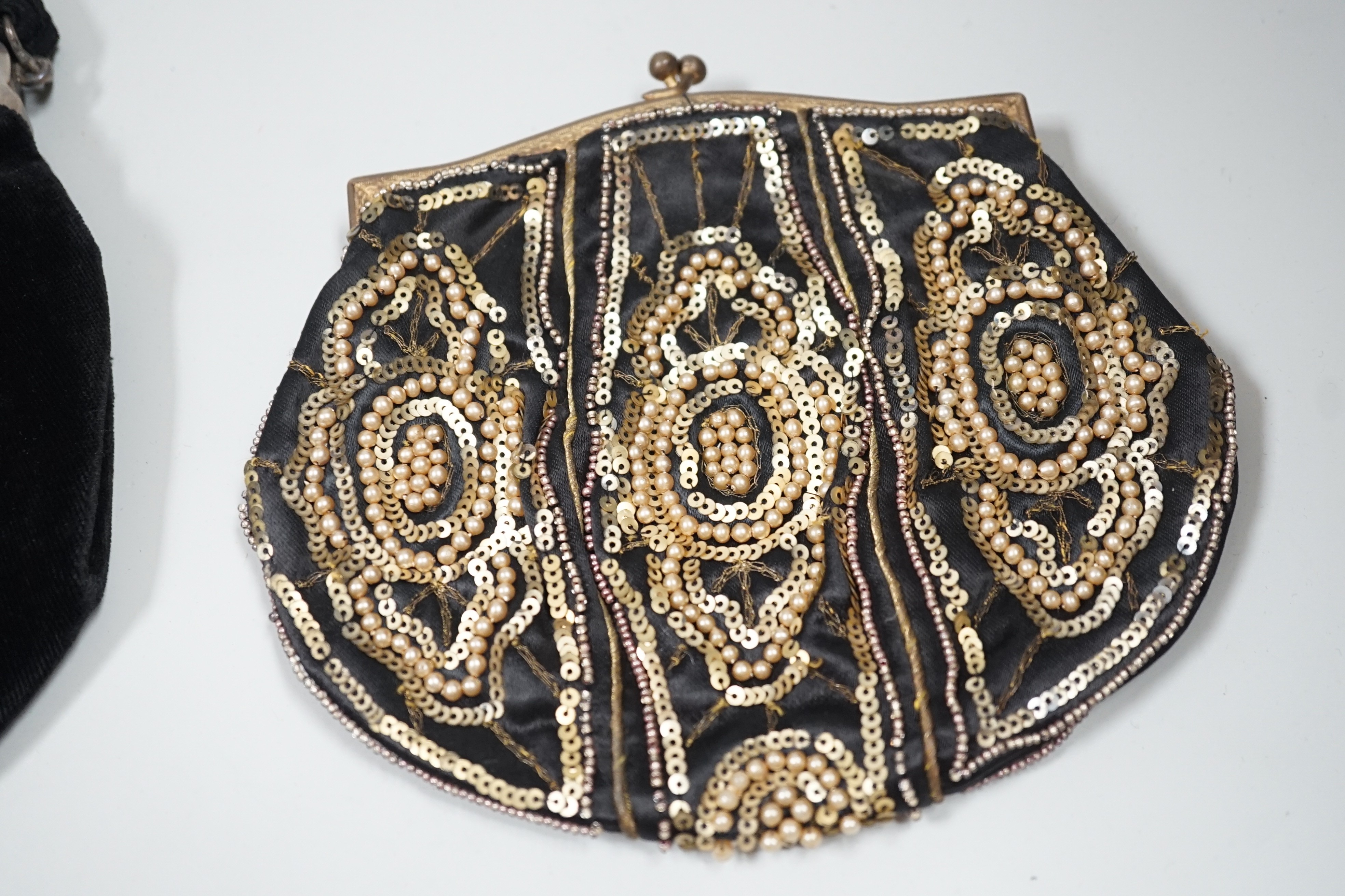 A 1930’s evening bag with silver frame, seven 1930’s-40’s evening bags with diamante encrusted Bakelite frames and clasps, a costume jewelled bag and two gilt and sequin bags